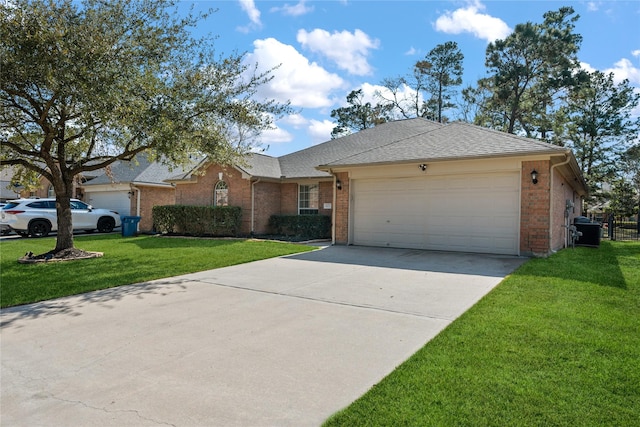 ranch-style house with driveway, brick siding, and a front yard