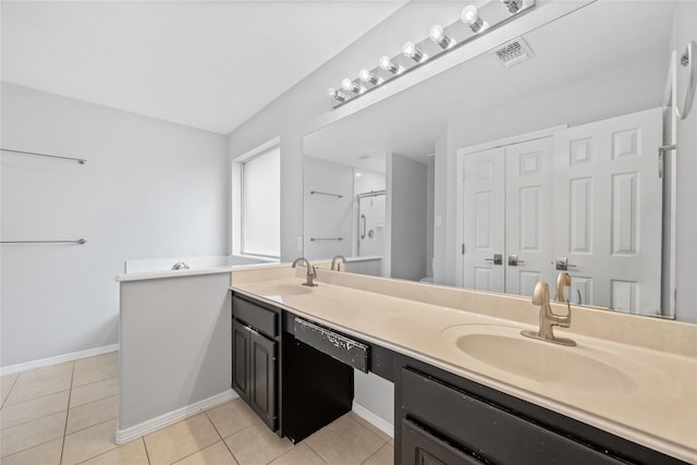 full bath featuring tile patterned flooring, visible vents, a sink, and double vanity