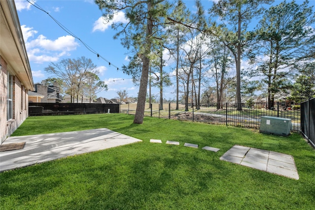 view of yard featuring a fenced backyard and a patio