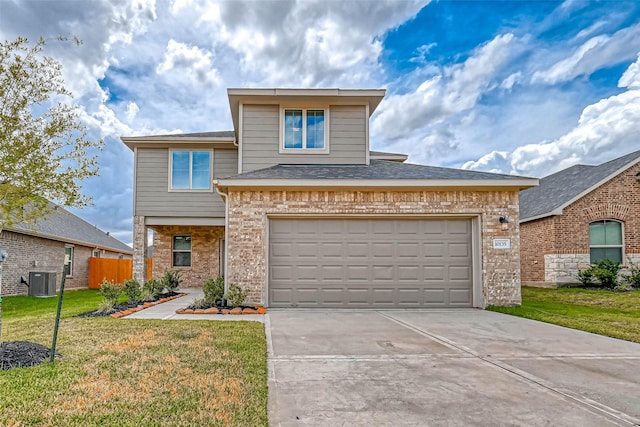 view of front of house with a garage, central air condition unit, and a front lawn