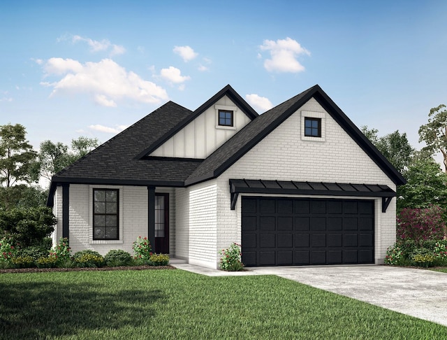 view of front of house with a garage and a front lawn