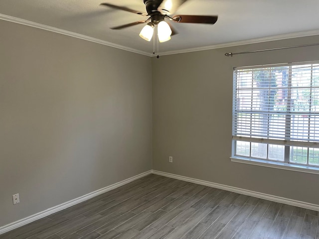 empty room with plenty of natural light, ornamental molding, dark hardwood / wood-style floors, and ceiling fan