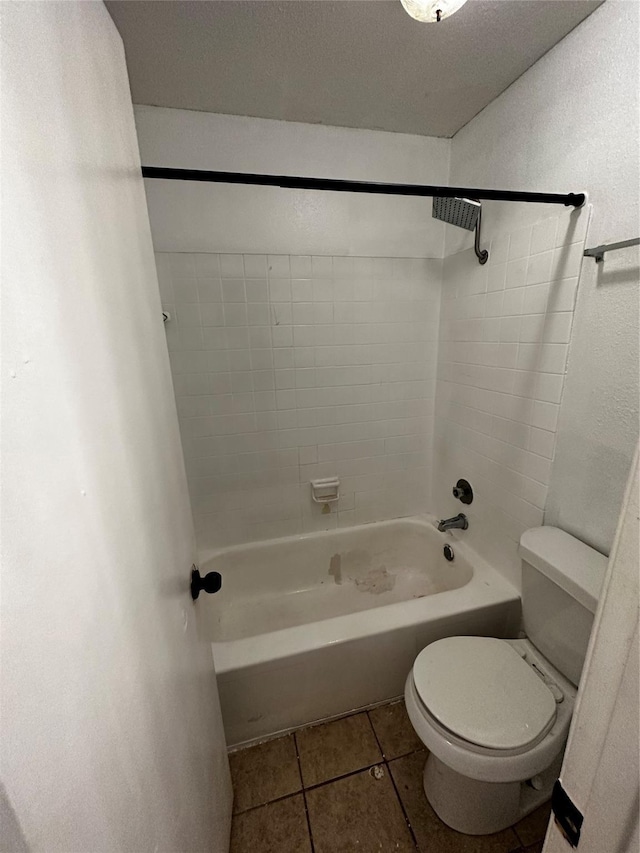 5625 Antoine Dr Unit 1309, Houston, TX 77091 - bathroom with tiled shower / bath, toilet, and tile patterned flooring