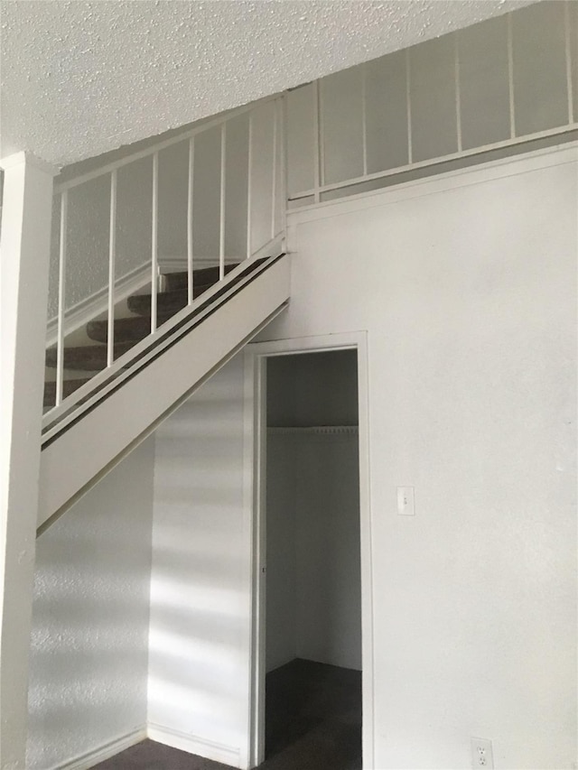 5625 Antoine Dr Unit 1309, Houston, TX 77091 - staircase with a textured ceiling