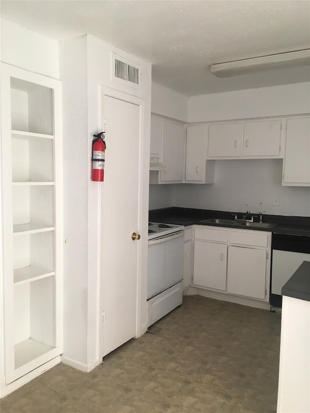 5625 Antoine Dr Unit 1309, Houston, TX 77091 - kitchen featuring white cabinets, dishwasher, sink, and electric range