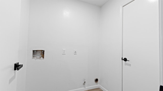 laundry room featuring hookup for a washing machine, hookup for a gas dryer, laundry area, baseboards, and electric dryer hookup