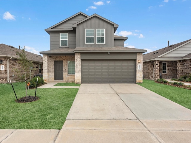 view of front of house with a garage and a front lawn