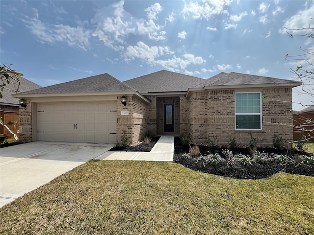 view of front of house with a garage, brick siding, and driveway