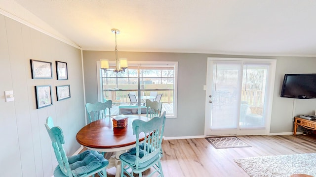 29331 County Rd 25, Damon, TX 77430 - dining area with an inviting chandelier, ornamental molding, and wood-type flooring