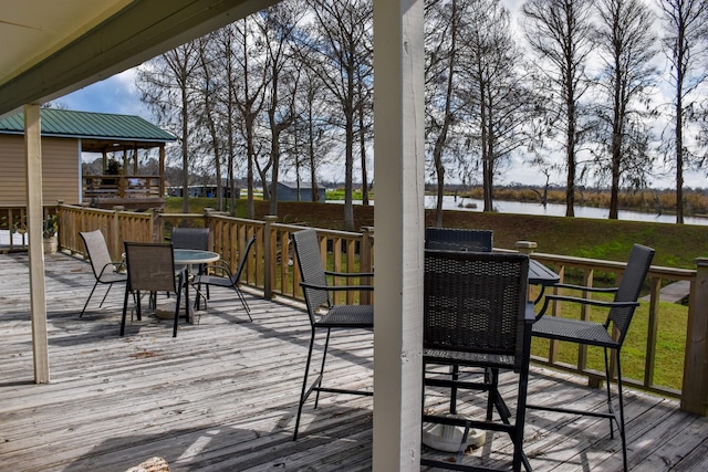 29331 County Rd 25, Damon, TX 77430 - wooden terrace featuring a water view