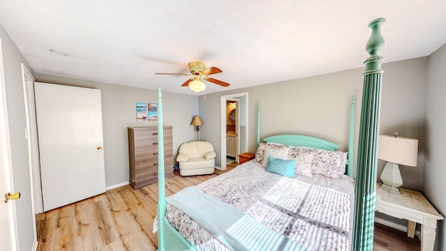 29331 County Rd 25, Damon, TX 77430 - bedroom with ceiling fan and light wood-type flooring