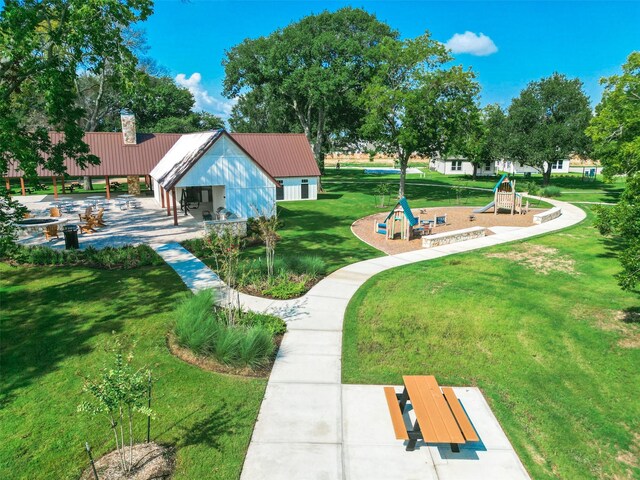 23506 Daisy Grubber Ln, Hockley, TX 77447 - view of home's community featuring a yard