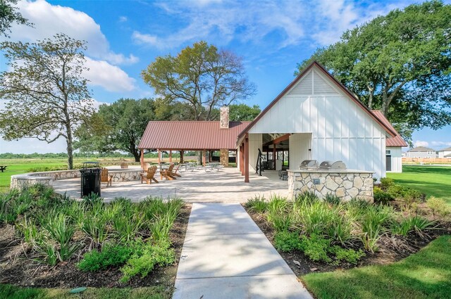 23506 Daisy Grubber Ln, Hockley, TX 77447 - view of home's community with exterior kitchen, a patio, and a gazebo