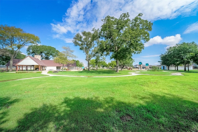 23506 Daisy Grubber Ln, Hockley, TX 77447 - view of community featuring a lawn and an attached garage