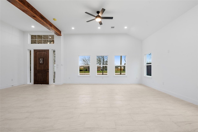 unfurnished living room with beamed ceiling, high vaulted ceiling, and ceiling fan