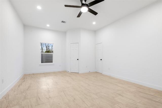 empty room featuring ceiling fan