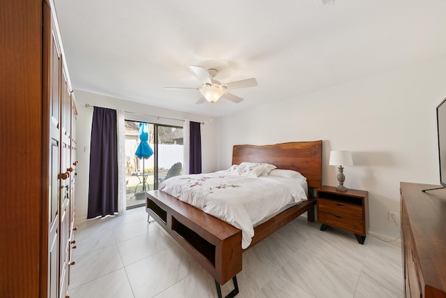 bedroom featuring access to outside and ceiling fan