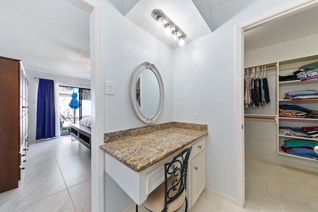 bathroom featuring vanity and tile patterned floors