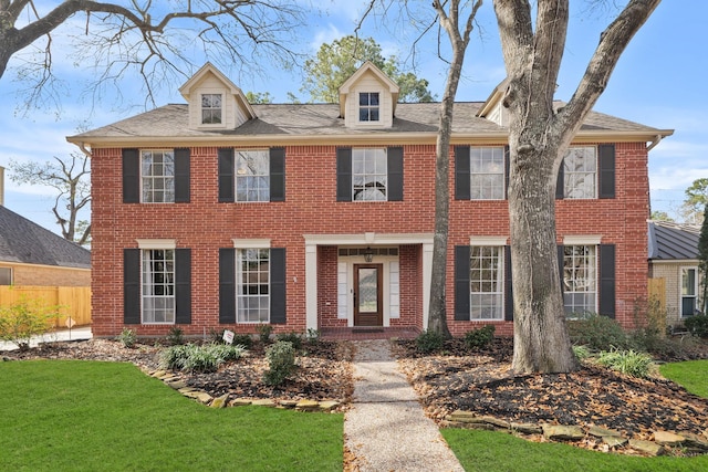 colonial house with a front lawn