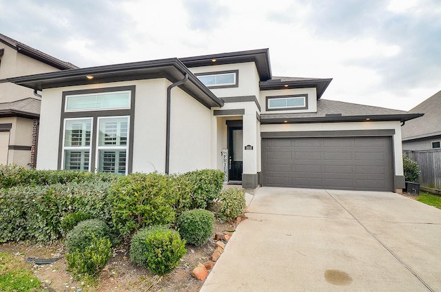 prairie-style house featuring a garage