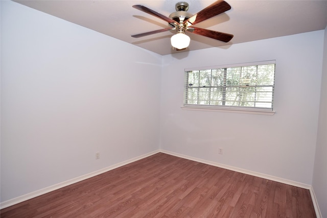 unfurnished room with hardwood / wood-style flooring and ceiling fan