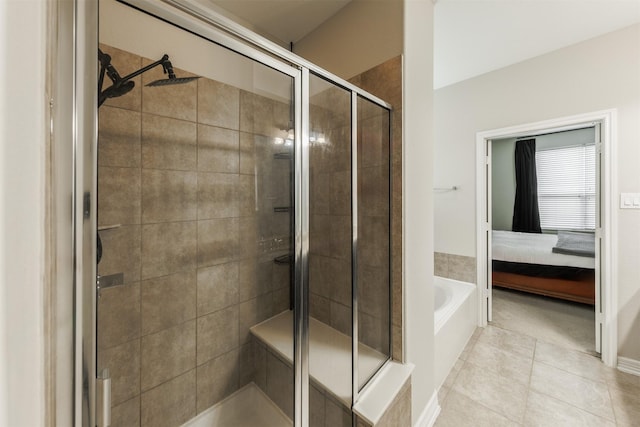 bathroom featuring independent shower and bath and tile patterned floors