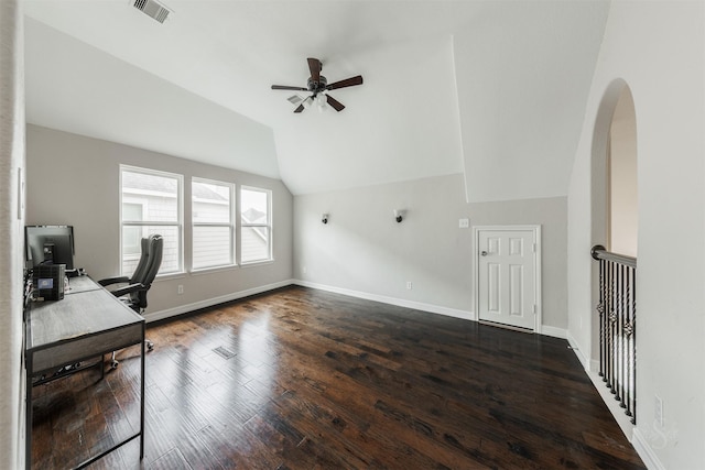 unfurnished office featuring ceiling fan, lofted ceiling, and dark hardwood / wood-style flooring