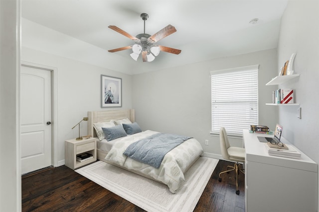 bedroom featuring dark hardwood / wood-style flooring and ceiling fan