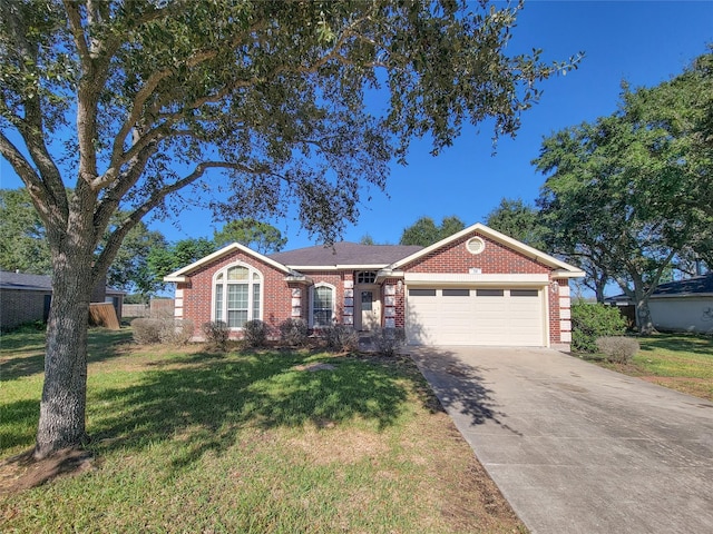 single story home featuring a garage and a front yard