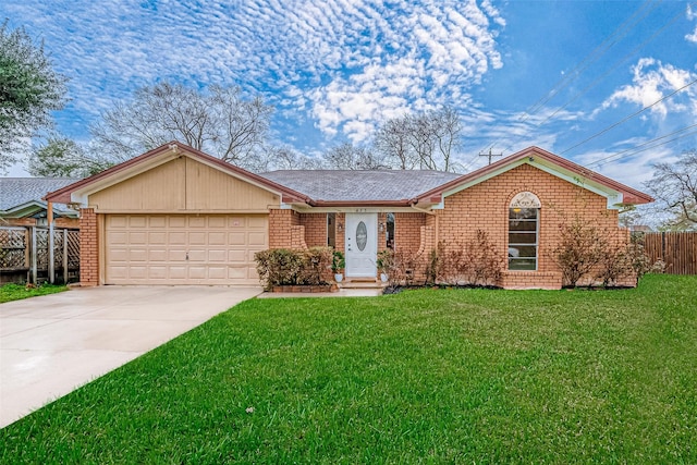 ranch-style house featuring a garage and a front yard