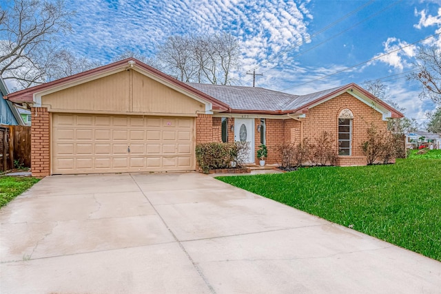 ranch-style house featuring a garage and a front yard