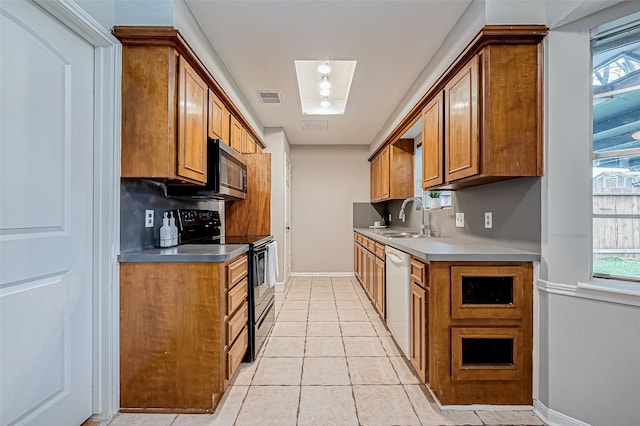 kitchen with sink, tasteful backsplash, light tile patterned floors, white dishwasher, and black range with electric cooktop