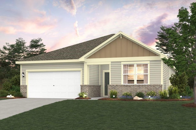 view of front facade with a garage and a yard