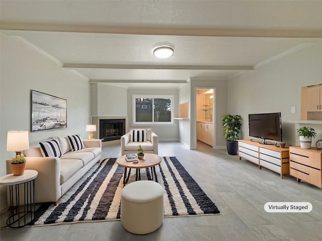 living room with ornamental molding and beamed ceiling