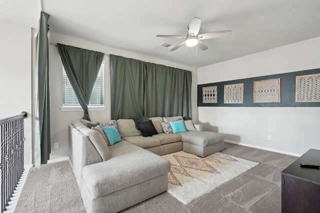 living room featuring ceiling fan and carpet flooring