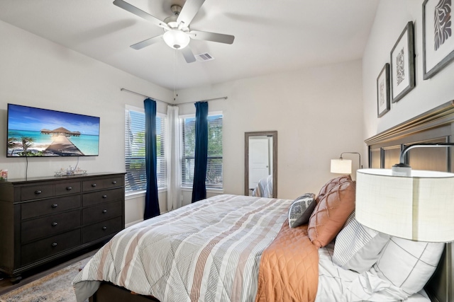 bedroom featuring ceiling fan and light hardwood / wood-style floors