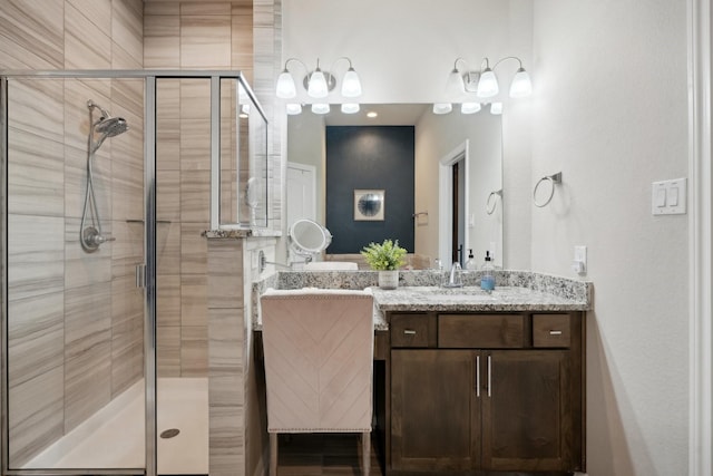 bathroom with vanity and walk in shower