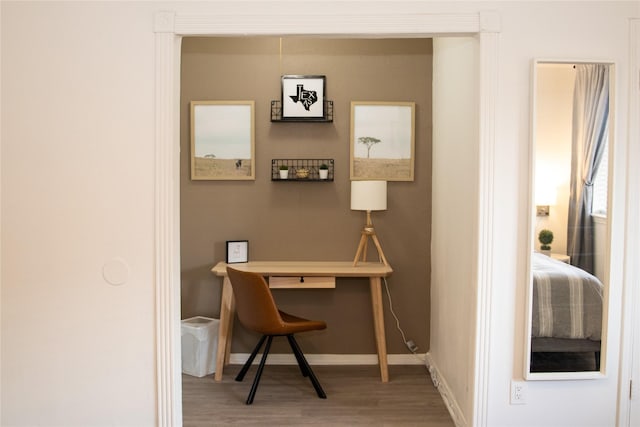 office area with hardwood / wood-style flooring