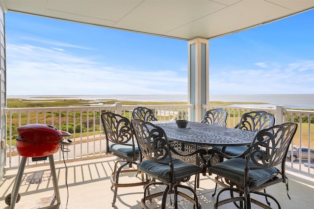 deck featuring a water view