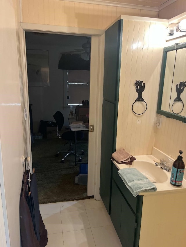 bathroom featuring tile patterned floors and vanity