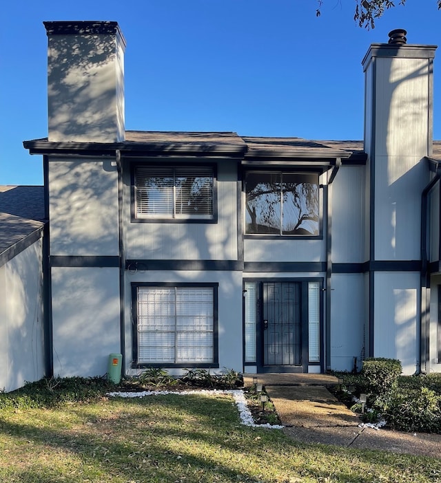 view of front of property with a chimney