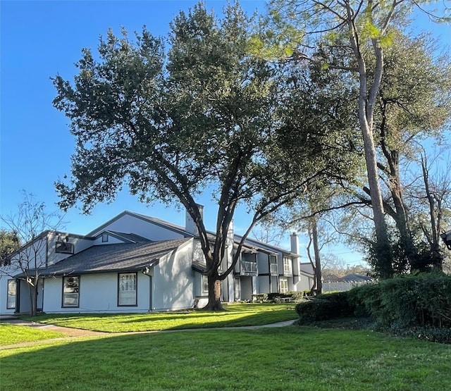 exterior space with a front yard