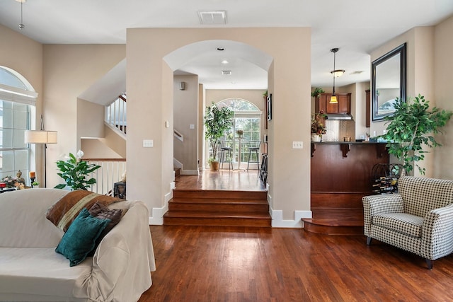 foyer with dark wood-type flooring