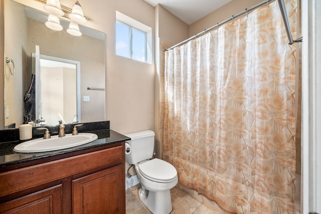 bathroom featuring a shower with shower curtain, vanity, toilet, and tile patterned flooring