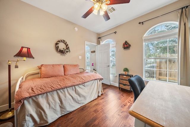 bedroom featuring dark hardwood / wood-style flooring and ceiling fan