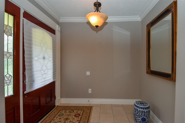 entryway featuring crown molding and light tile patterned floors