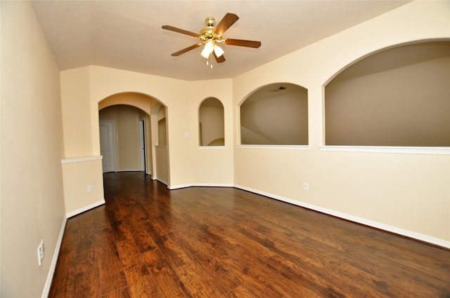 9210 Hidden Lake E Lake E, Magnolia, TX 77354 - unfurnished room featuring ceiling fan, arched walkways, baseboards, and wood finished floors