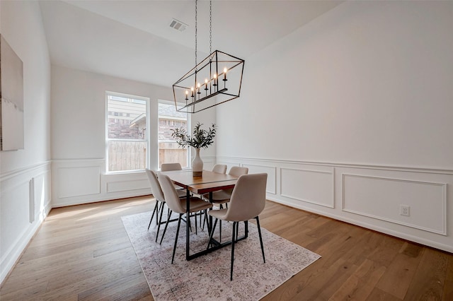 dining space featuring hardwood / wood-style flooring