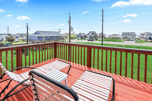 wooden terrace with a yard