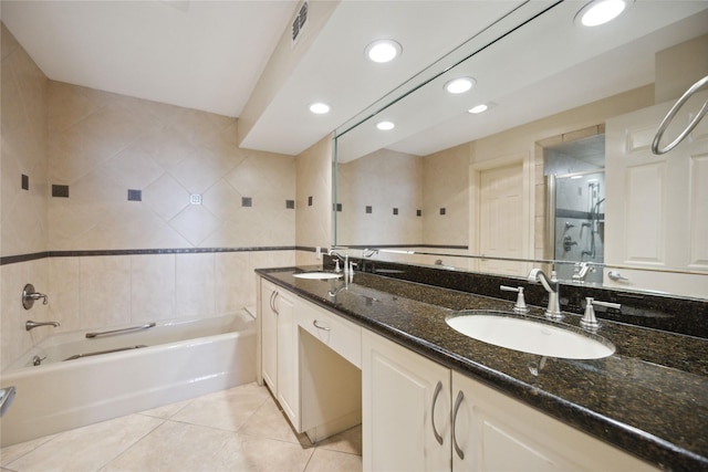 bathroom featuring tile patterned flooring, vanity, tile walls, and separate shower and tub